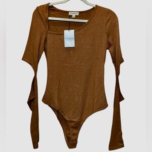 Promesa Ribbed Long Sleeve Bodysuit elbows out asymmetrical neckline